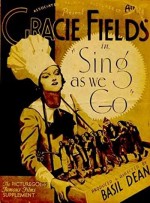 Sing As We Go (1934) afişi